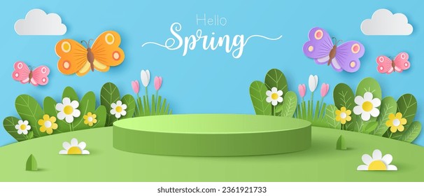 Paper cut of field of flowers and flocks of butterfly on blue sky background with green cylinder podium for your products display presentation. Hello spring.