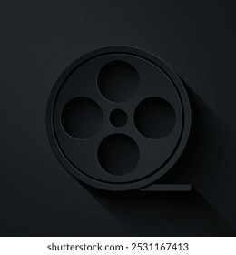 Paper cut Film reel icon isolated on black background. Paper art style. Vector