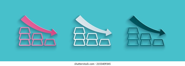 Paper cut Finance falling chart arrow with gold bars icon isolated on blue background. Financial success concept. Gold investment concept. Paper art style. Vector