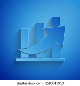 Paper cut Financial growth and coin icon isolated on blue background. Increasing revenue. Paper art style. Vector Illustration