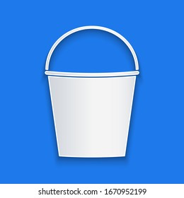 Paper cut Fire bucket icon isolated on blue background. Metal bucket empty or with water for fire fighting. Paper art style. Vector Illustration