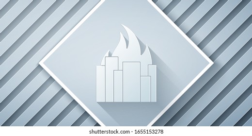 Paper cut Fire in burning buildings on city street icon isolated on grey background. Destroyed city on fire. Paper art style. Vector Illustration