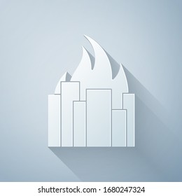 Paper cut Fire in burning buildings on city street icon isolated on grey background. Destroyed city on fire. Paper art style. Vector Illustration