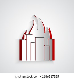 Paper cut Fire in burning buildings on city street icon isolated on grey background. Destroyed city on fire. Paper art style. Vector Illustration