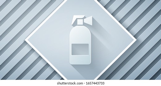 Paper cut Fire extinguisher icon isolated on grey background. Paper art style. Vector Illustration