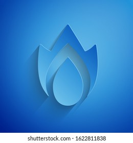 Paper cut Fire flame icon isolated on blue background. Heat symbol. Paper art style. Vector Illustration