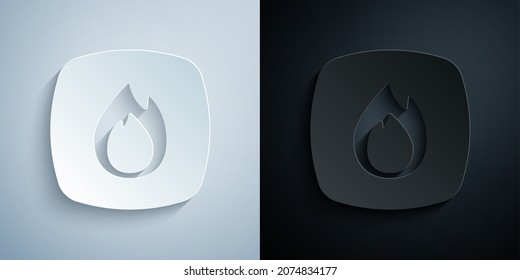 Paper cut Fire flame icon isolated on grey and black background. Paper art style. Vector