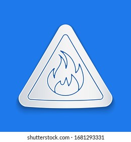 Paper cut Fire flame in triangle icon isolated on blue background. Warning sign of flammable product. Paper art style. Vector Illustration