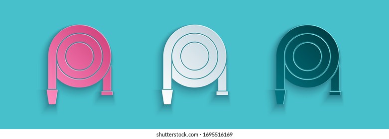 Paper cut Fire hose reel icon isolated on blue background. Paper art style. Vector Illustration