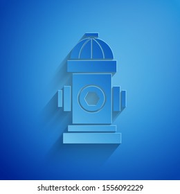 Paper cut Fire hydrant icon isolated on blue background. Paper art style. Vector Illustration
