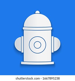 Paper cut Fire hydrant icon isolated on blue background. Paper art style. Vector Illustration