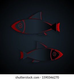 Paper cut Fish icon isolated on black background. Paper art style. Vector Illustration