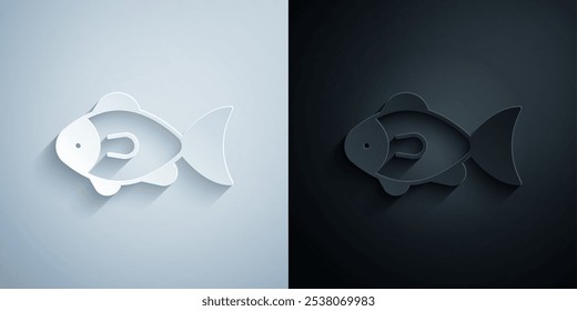 Paper cut Fish icon isolated on grey and black background. Paper art style. Vector