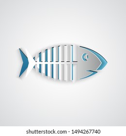 Paper cut Fish skeleton icon isolated on grey background. Fish bone sign. Paper art style. Vector Illustration