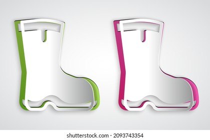 Paper cut Fishing boots icon isolated on grey background. Waterproof rubber boot. Gumboots for rainy weather, fishing, hunter, gardening. Paper art style. Vector