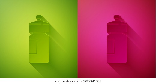 Paper cut Fitness shaker icon isolated on green and pink background. Sports shaker bottle with lid for water and protein cocktails. Paper art style. Vector