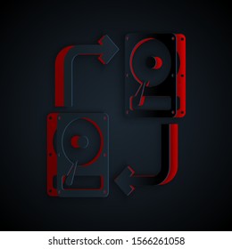 Paper cut A fixed data storage device hard disk with arrows, data copy icon isolated on black background. Data exchange with hard disk drive. Paper art style. Vector Illustration