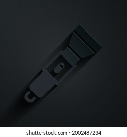 Paper cut Flashlight icon isolated on black background. Paper art style. Vector