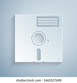 Paper cut Floppy disk in the 5.25-inch icon isolated on grey background. Floppy disk for computer data storage. Diskette sign. Paper art style. Vector Illustration