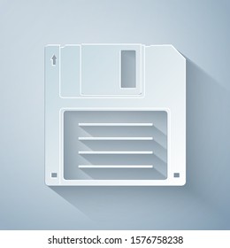 Paper cut Floppy disk for computer data storage icon isolated on grey background. Diskette sign. Paper art style. Vector Illustration