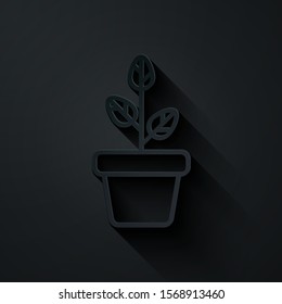 Paper cut Flowers in pot icon isolated on black background. Plant growing in a pot. Potted plant sign. Paper art style. Vector Illustration