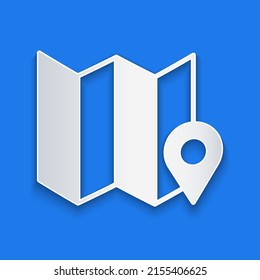 Recorte de papel Mapa doblado con icono de marcador de posición aislado en fondo azul. Estilo de arte de papel. Vector