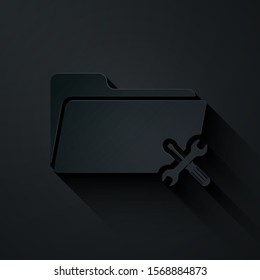 Paper cut Folder with screwdriver and wrench icon isolated on black background. Adjusting, service, setting, maintenance, repair, fixing. Paper art style. Vector Illustration