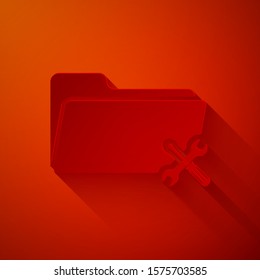 Paper cut Folder with screwdriver and wrench icon isolated on red background. Adjusting, service, setting, maintenance, repair, fixing. Paper art style. Vector Illustration