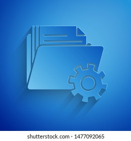 Paper cut Folder settings with gears icon isolated on blue background. Software update, transfer protocol, teamwork tool management. Paper art style. Vector Illustration