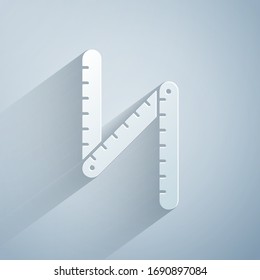 Paper cut Folding ruler icon isolated on grey background. Paper art style. Vector Illustration