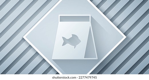 Paper cut Food for fish icon isolated on grey background. Paper art style. Vector