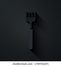 Paper cut Fork icon isolated on black background. Cutlery symbol. Paper art style. Vector Illustration