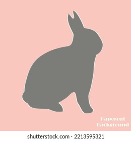 Paper cut in the form of rabbit in satin gray color.
