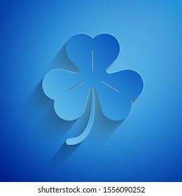 Paper cut Four leaf clover icon isolated on blue background. Happy Saint Patrick day. Paper art style. Vector Illustration