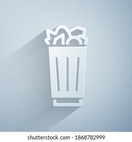 Paper cut Full trash can icon isolated on grey background. Garbage bin sign. Recycle basket icon. Office trash icon. Paper art style. Vector
