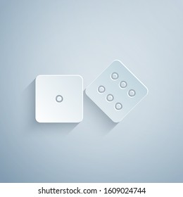 Paper cut Game dice icon isolated on grey background. Casino gambling. Paper art style. Vector Illustration