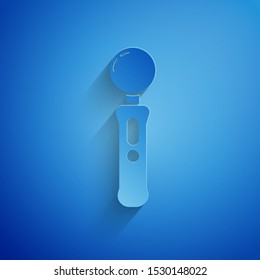 Paper cut Gamepad icon isolated on blue background. Game controller. Paper art style. Vector Illustration