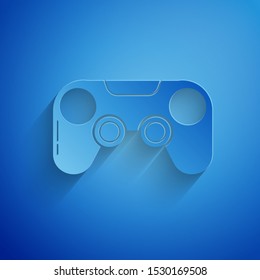 Paper cut Gamepad icon isolated on blue background. Game controller. Paper art style. Vector Illustration
