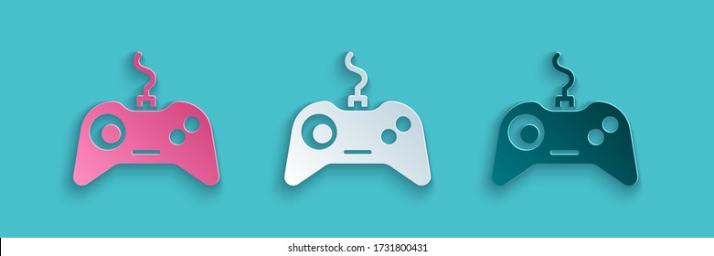 Paper cut Gamepad icon isolated on blue background. Game controller. Paper art style. Vector Illustration