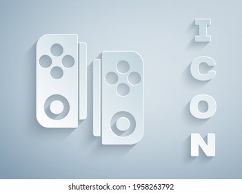 Paper cut Gamepad icon isolated on grey background. Game controller. Paper art style. Vector Illustration