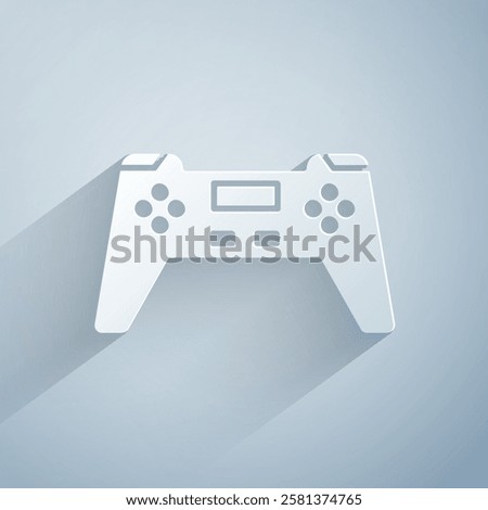 Paper cut Gamepad icon isolated on grey background. Game controller. Paper art style. Vector Illustration