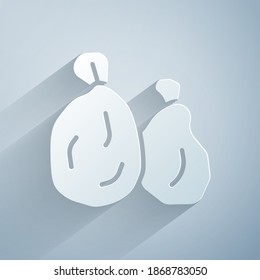 Paper cut Garbage bag icon isolated on grey background. Paper art style. Vector