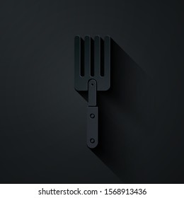 Paper cut Garden fork icon isolated on black background. Pitchfork icon. Tool for horticulture, agriculture, farming. Paper art style. Vector Illustration