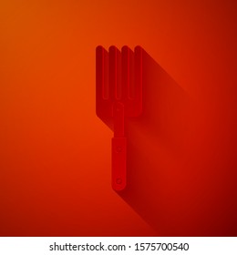 Paper cut Garden fork icon isolated on red background. Pitchfork icon. Tool for horticulture, agriculture, farming. Paper art style. Vector Illustration