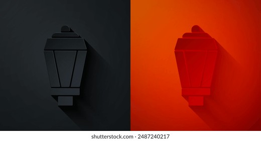 Paper cut Garden light lamp icon isolated on black and red background. Solar powered lamp. Lantern. Street lamp. Paper art style. Vector