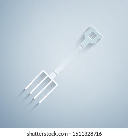 Paper cut Garden pitchfork icon isolated on grey background. Garden fork sign. Tool for horticulture, agriculture, farming. Paper art style. Vector Illustration
