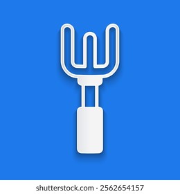 Paper cut Garden rake icon isolated on blue background. Tool for horticulture, agriculture, farming. Ground cultivator. Housekeeping equipment. Paper art style. Vector