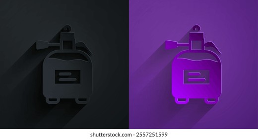 Paper cut Garden sprayer for water, fertilizer, chemicals icon isolated on black on purple background. Paper art style. Vector