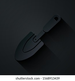 Paper cut Garden trowel spade or shovel icon isolated on black background. Gardening tool. Tool for horticulture, agriculture, farming. Paper art style. Vector Illustration
