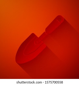 Paper cut Garden trowel spade or shovel icon isolated on red background. Gardening tool. Tool for horticulture, agriculture, farming. Paper art style. Vector Illustration